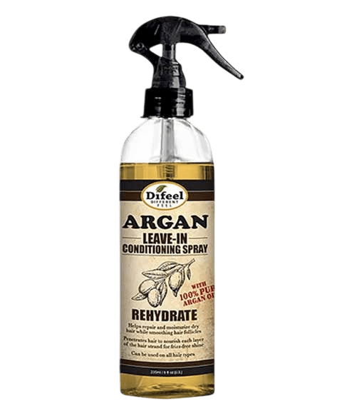Clear plastic spray bottle with a black trigger nozzle, filled with amber liquid, labeled "Difeel Argan Leave-In Conditioning Spray with 100% Pure Argan Oil, Rehydrate", against a plain light gray background.