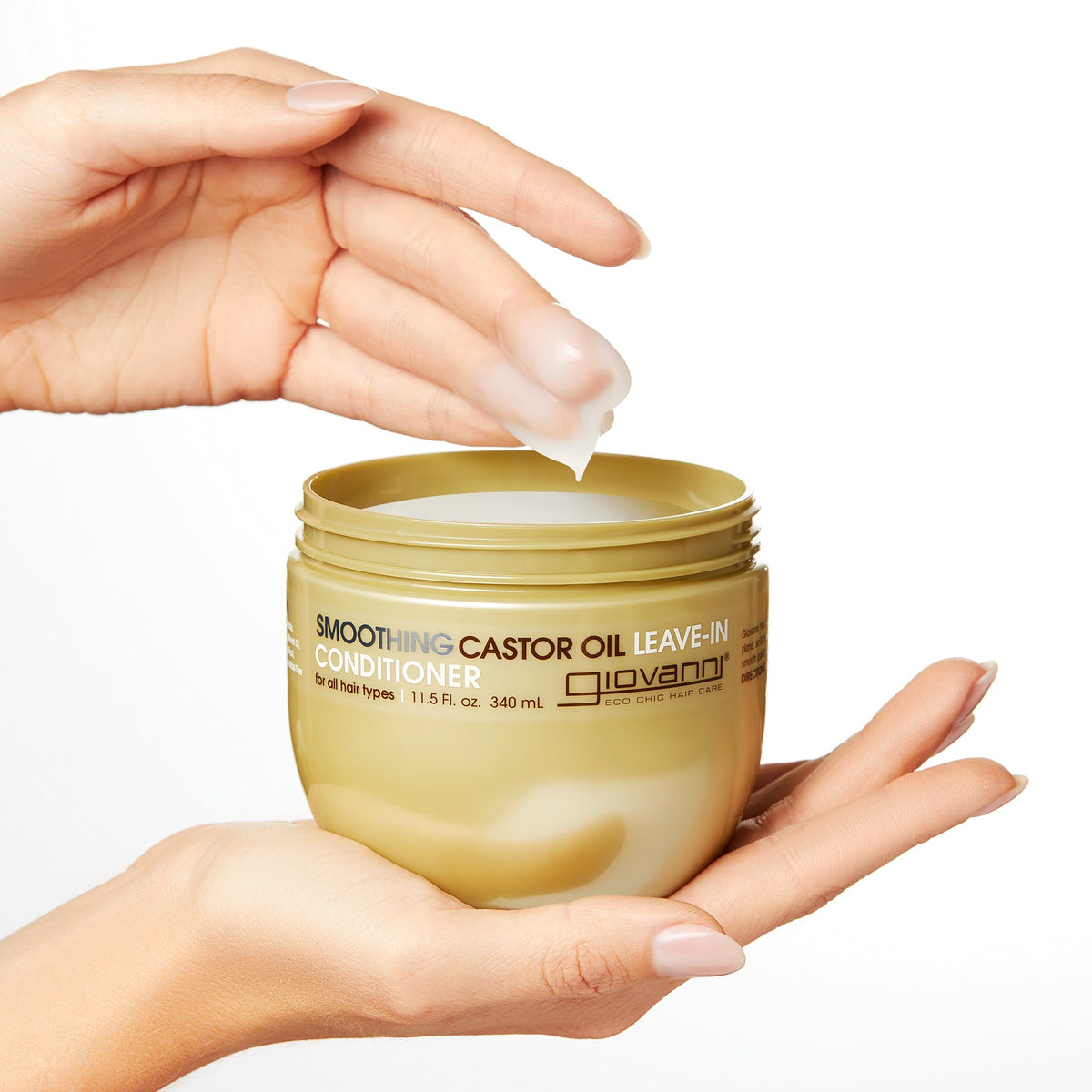 Close-up of hands holding open jar