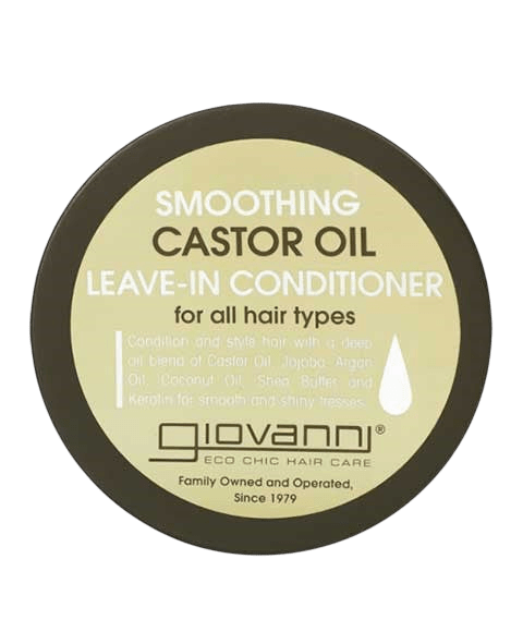 Round dark-brown jar lid viewed straight-on, with a cream label reading "Smoothing Castor Oil Leave-In Conditioner for all hair types, Giovanni Eco Chic Hair Care, Family Owned and Operated, Since 1979", on a plain light gray background.